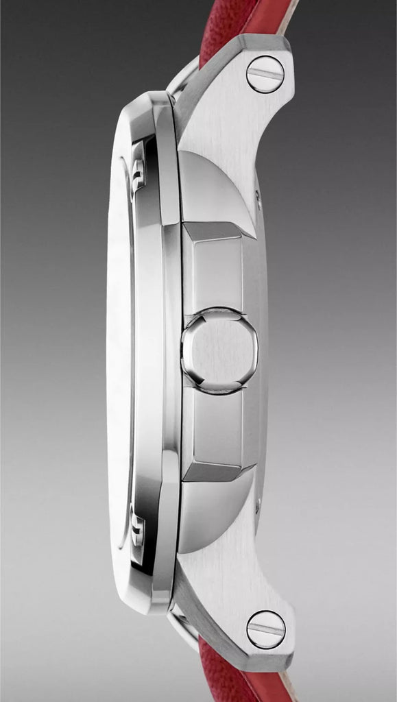 Side profile of Burberry Brit The Britain watch showing silver case and red leather strap