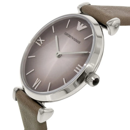 Close-up of Emporio Armani Gianni T-Bar dial with Roman numerals and wing logo