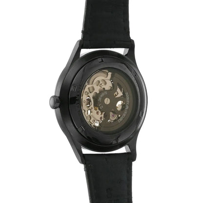 AR1923 caseback revealing automatic mechanical movement with visible gears and balance wheel