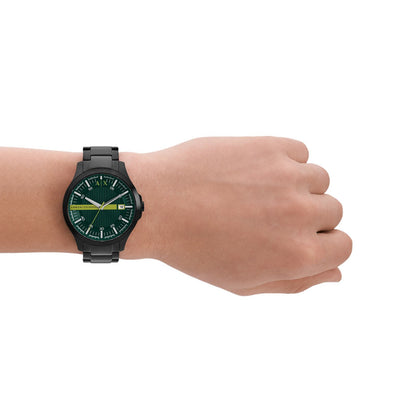 Armani Exchange Hampton AX2450 green dial watch worn on wrist with black bracelet