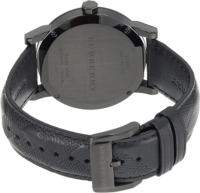Burberry City watch caseback showing engraved text and black leather strap