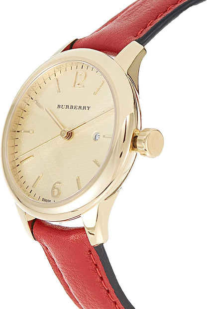 Burberry The Classic watch at angle showing cream dial, gold case, and burgundy leather strap