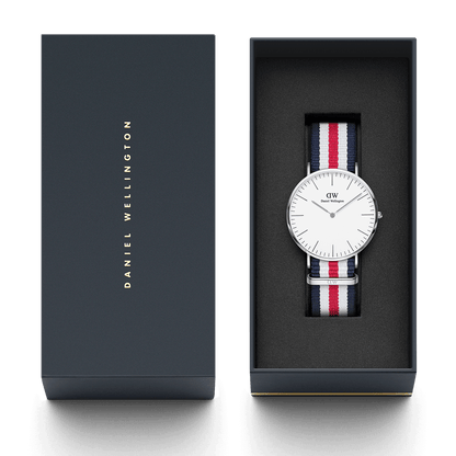 Daniel Wellington Canterbury watch in navy branded box with owner's guide and accessories