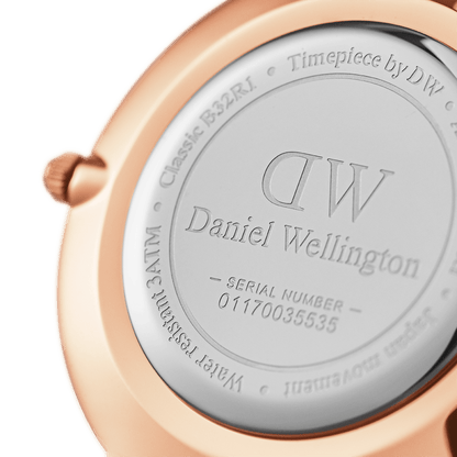 Case back showing DW Daniel Wellington logo and serial number engraved on rose gold