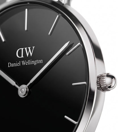Daniel Wellington dial close-up showing silver hands and minimalist index markers