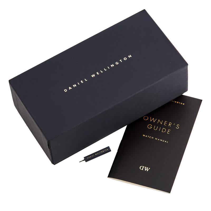 Daniel Wellington branded packaging with owner's guide and accessories