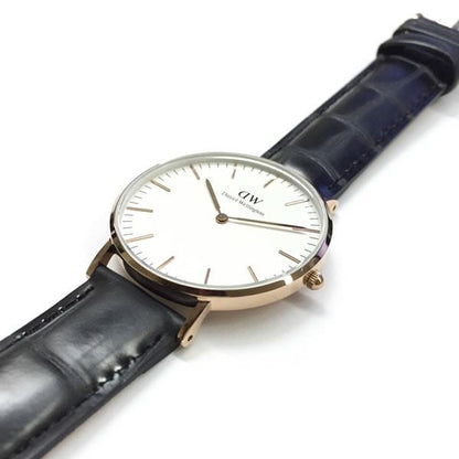 Daniel Wellington Reading 36mm watch worn on wrist with black leather strap