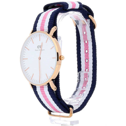 Daniel Wellington Southampton watch shown at angle displaying white dial, rose gold case, and full tricolour fabric strap