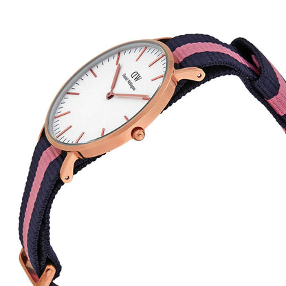 Side angle view of Winchester watch showing rose gold case and navy pink striped strap
