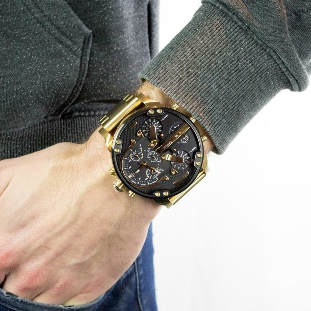 Diesel Mr. Daddy 2.0 worn on wrist showing gold case and black dial with chronograph subdials