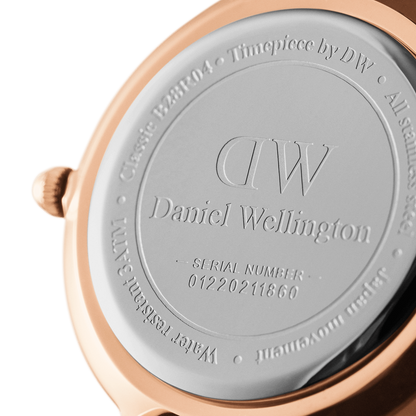 Daniel Wellington caseback showing engraved branding and serial number 04220211660