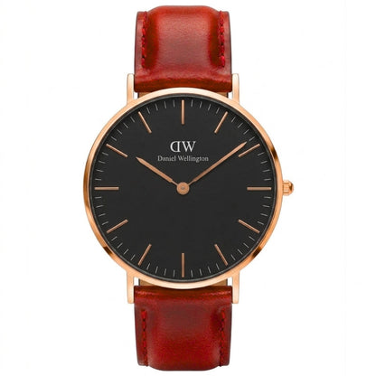 Daniel Wellington St. Mawes 28mm watch with black dial, rose gold case, and red leather strap