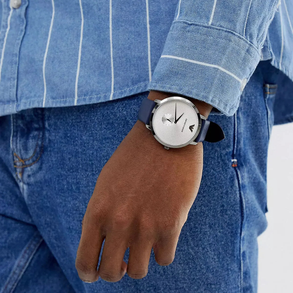 Emporio Armani AR11214 watch worn on wrist with striped denim shirt