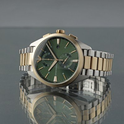 Emporio Armani AR11511 watch angled view showing green dial and mixed metal bracelet