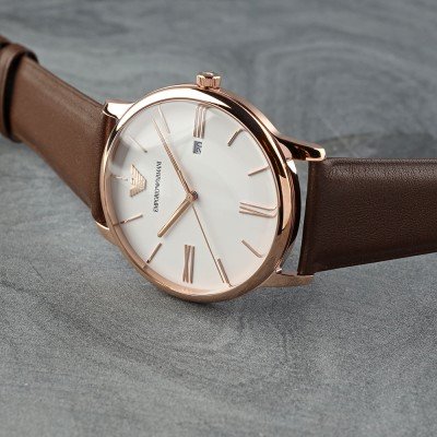 Angled view of Emporio Armani AR11572 with rose gold case and brown strap