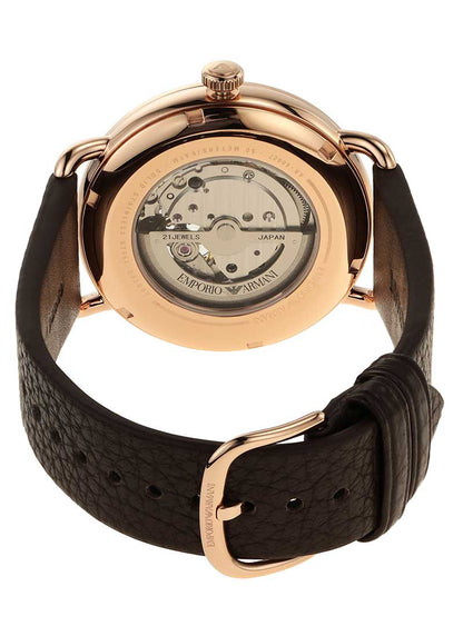 Rose gold caseback showing automatic mechanical movement and Emporio Armani marking