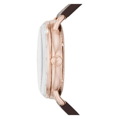 Side profile of rose gold watch case with brown leather strap
