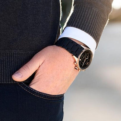 AR5905 chronograph watch worn on wrist with rose gold case and black strap