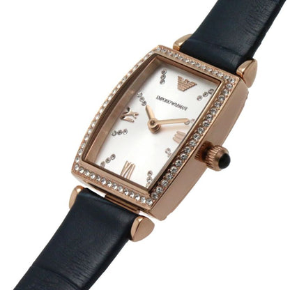 Angled view of Emporio Armani Gianni T-Bar watch showing rose gold tonneau case with crystal bezel and navy strap