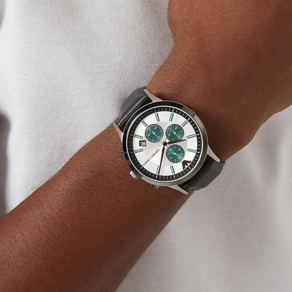 Emporio Armani Renato watch worn on wrist showing silver case and black leather strap