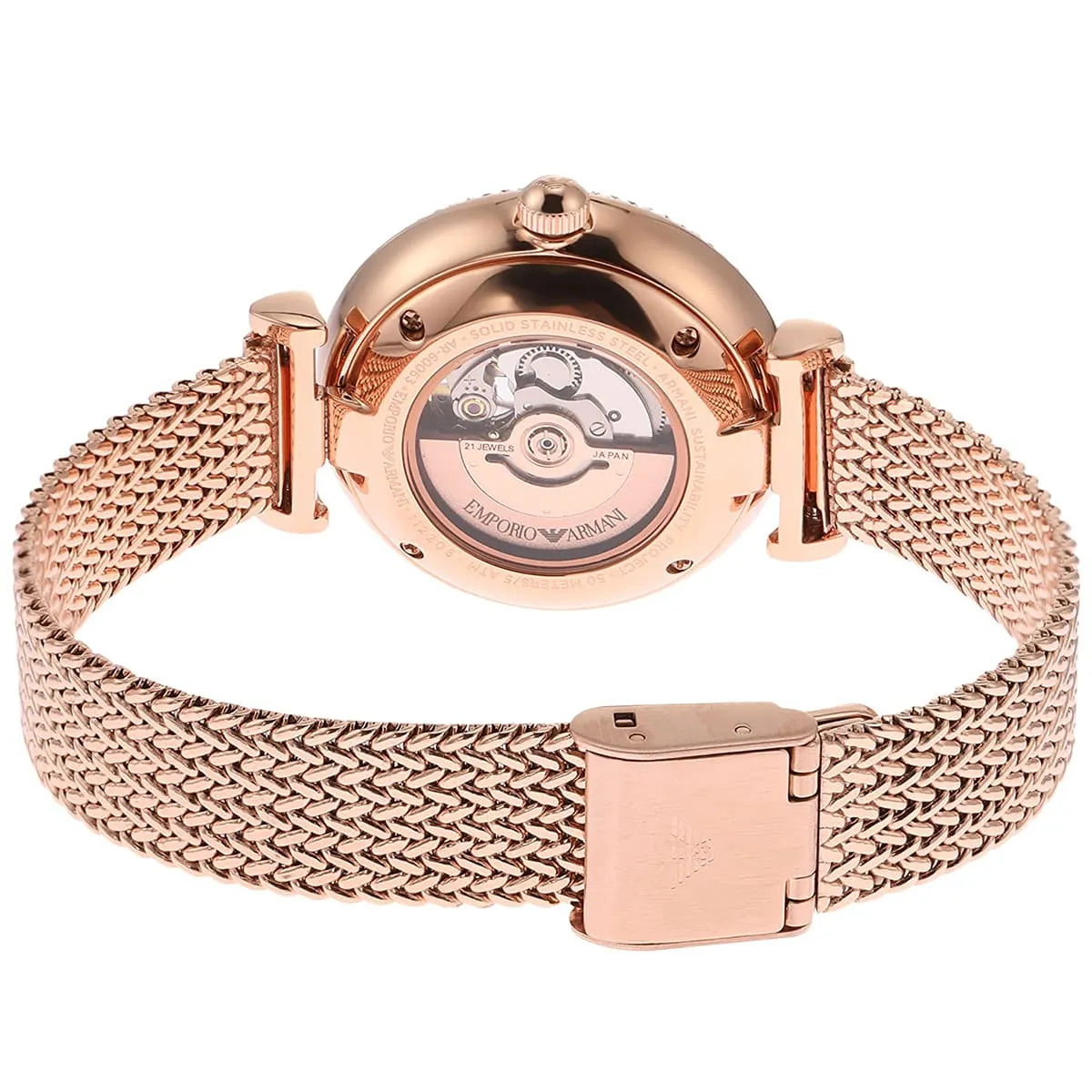 Rose gold watch with open caseback view showing mechanical movement