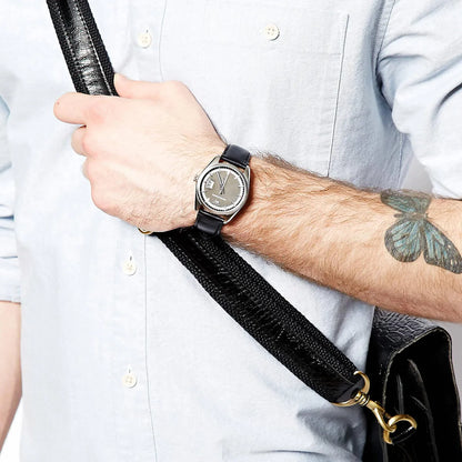 Emporio Armani Tazio AR6014 worn on wrist, showing silver case with black dial and leather strap