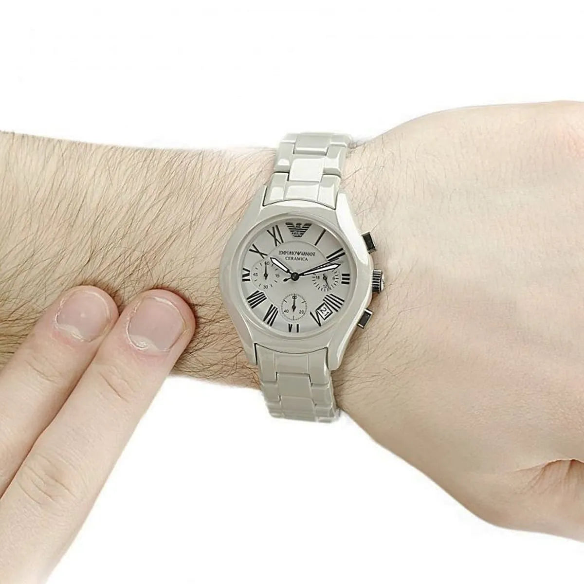 Emporio Armani Valente chronograph watch worn on wrist with white ceramic case