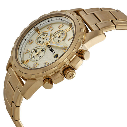 Angled side view of Fossil Dean chronograph with gold-tone case, champagne dial, and pushers