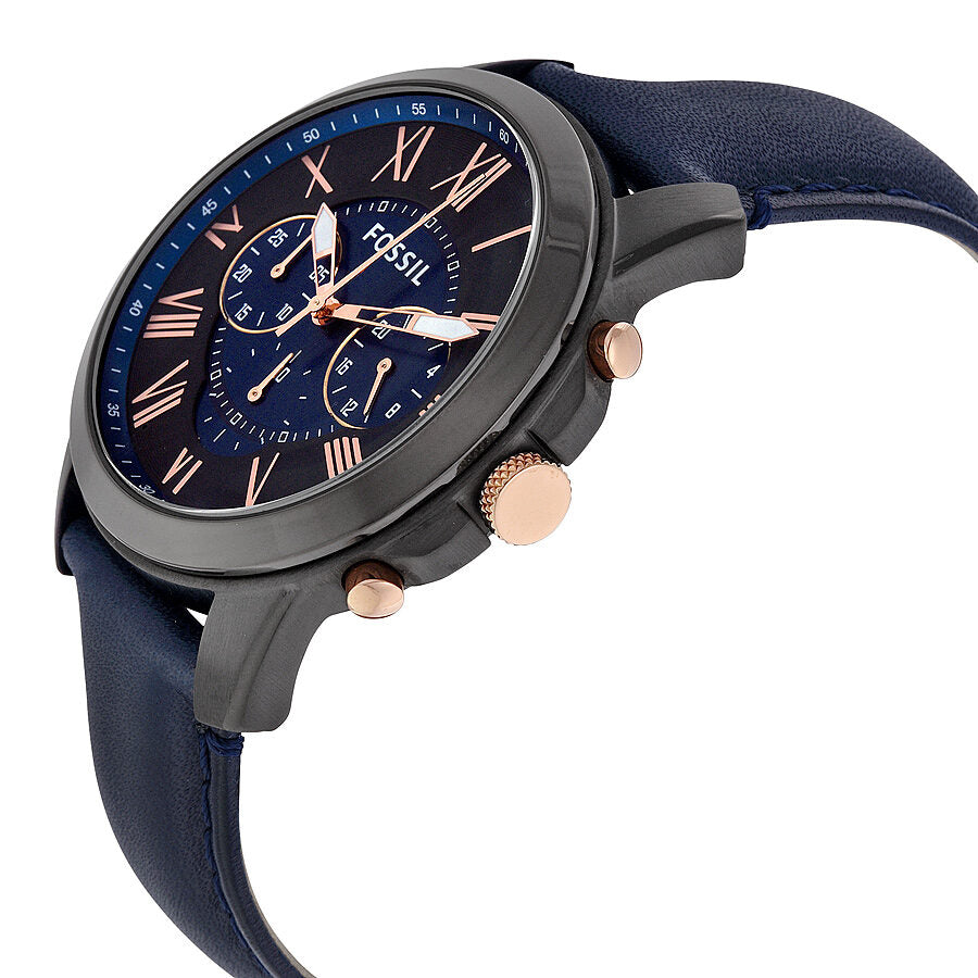 Fossil Grant chronograph watch displayed at angle showing rose gold pushers and navy leather strap