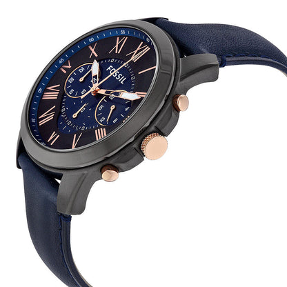 Fossil Grant chronograph watch displayed at angle showing rose gold pushers and navy leather strap
