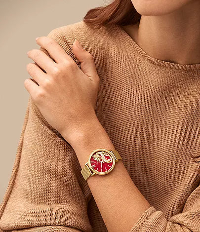 Fossil Jacqueline Dragonsteel watch worn on wrist with red dial and gold mesh band