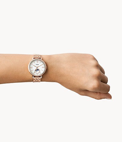 Fossil Jacqueline rose gold women's watch worn on wrist showing sun-moon dial