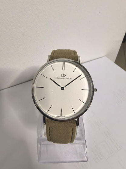 Lorenzen Dilimi watch with beige suede strap displayed on stand