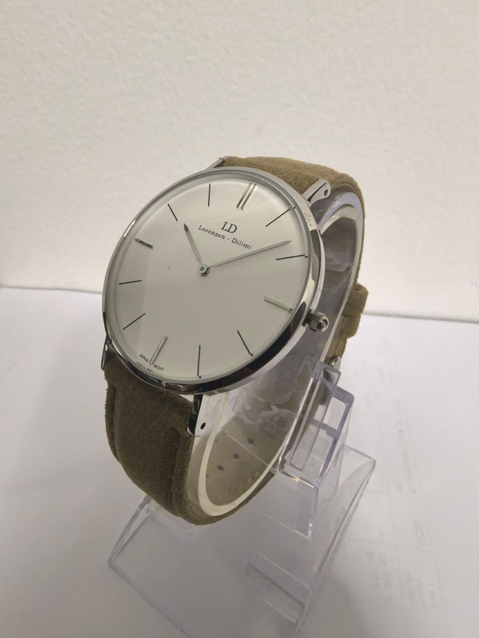 Lorenzen Dilimi watch side profile with beige suede strap