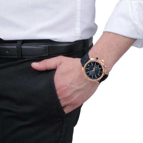 Maserati Circuito watch worn on wrist with rose gold case and blue dial