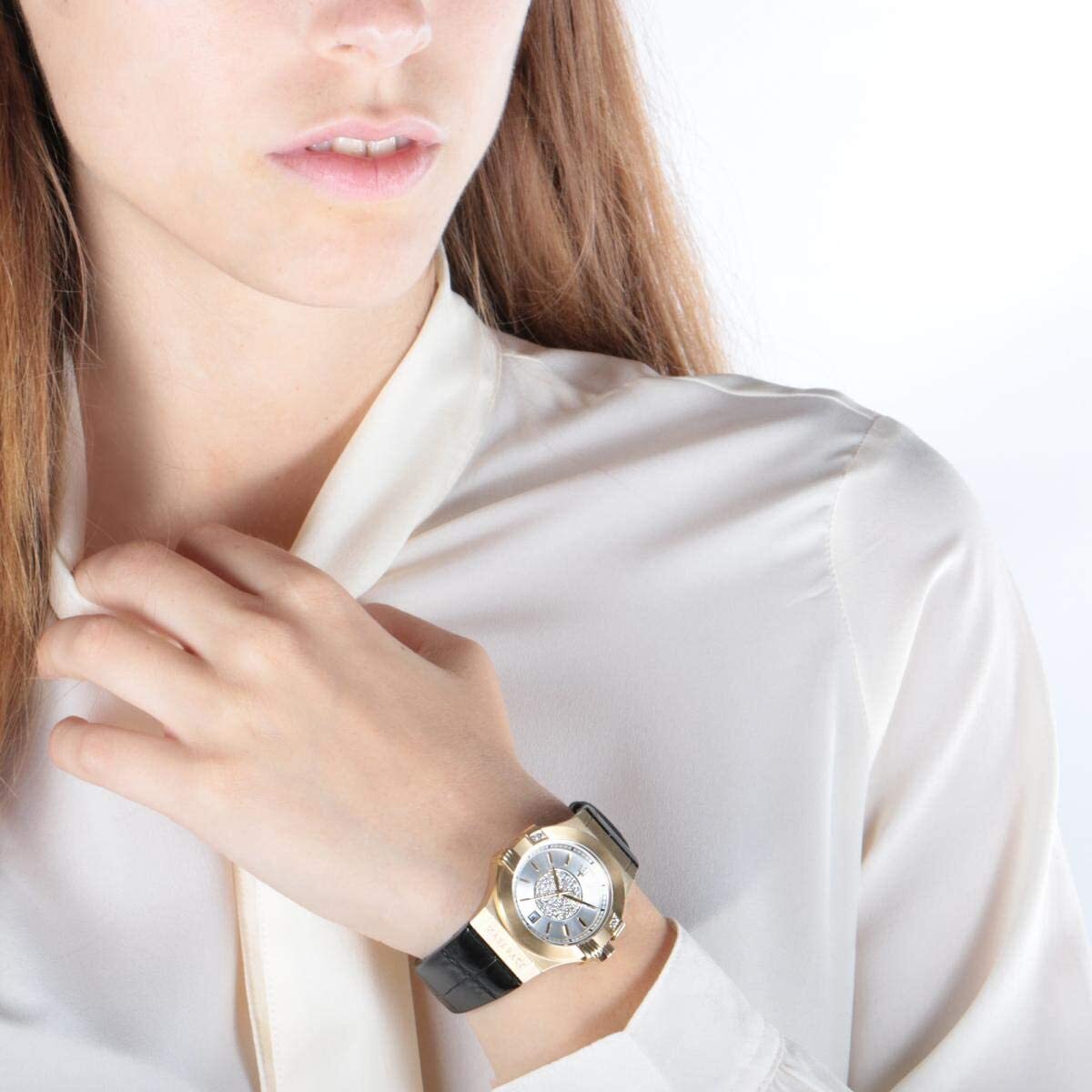Woman wearing Maserati Potenza watch with silver dial and gold-plated case on wrist