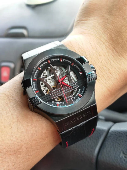 Maserati R8821108008 automatic skeleton watch worn on wrist showing black case and dial