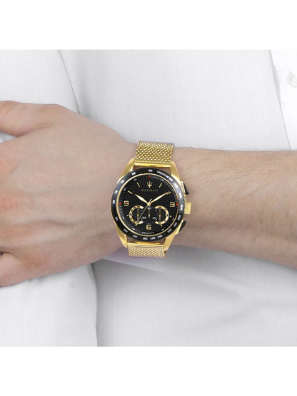 Maserati Traguardo chronograph watch worn on wrist with gold mesh bracelet