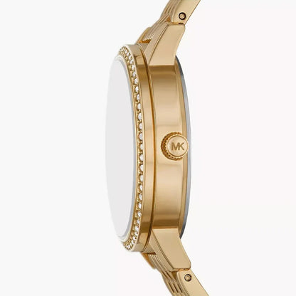 Side profile of Michael Kors Adrianna I watch showing gold-tone case, crystal bezel, and gold bracelet