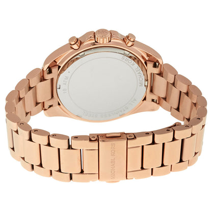 Michael Kors Bradshaw watch caseback showing rose gold stainless steel case and folding clasp