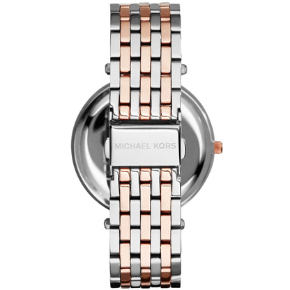 Michael Kors Darci watch caseback showing two-tone stainless steel bracelet