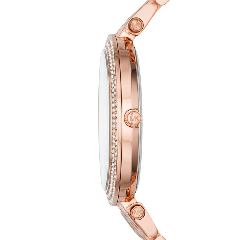 Side view of Michael Kors Darci rose gold watch showing case profile and crystal bezel