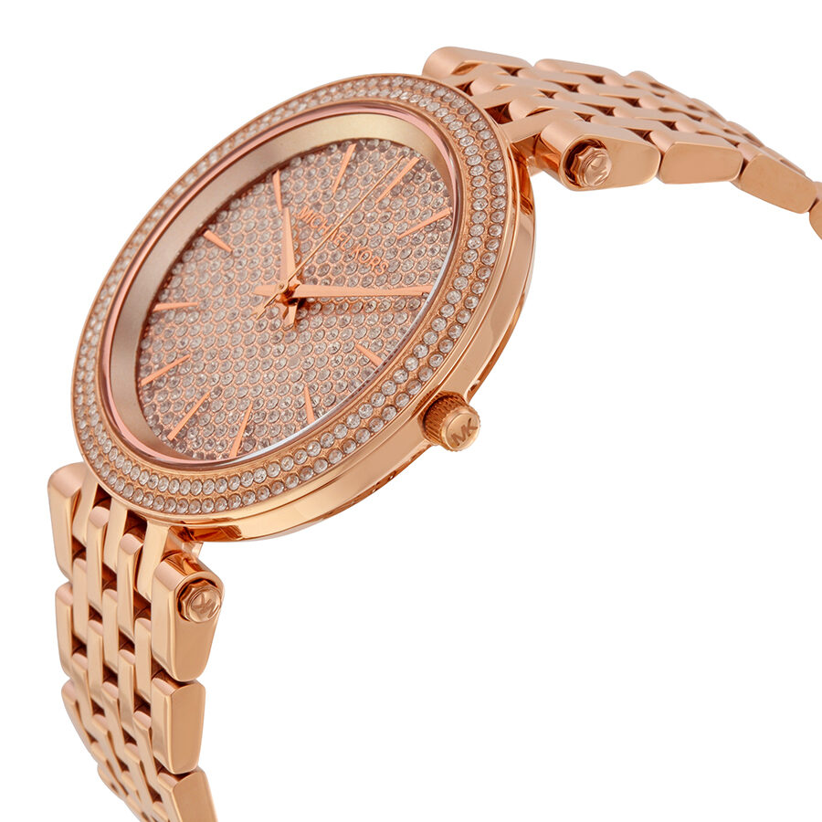 Angled view of Michael Kors Darci watch showing crystal-set bezel and rose-gold bracelet detail