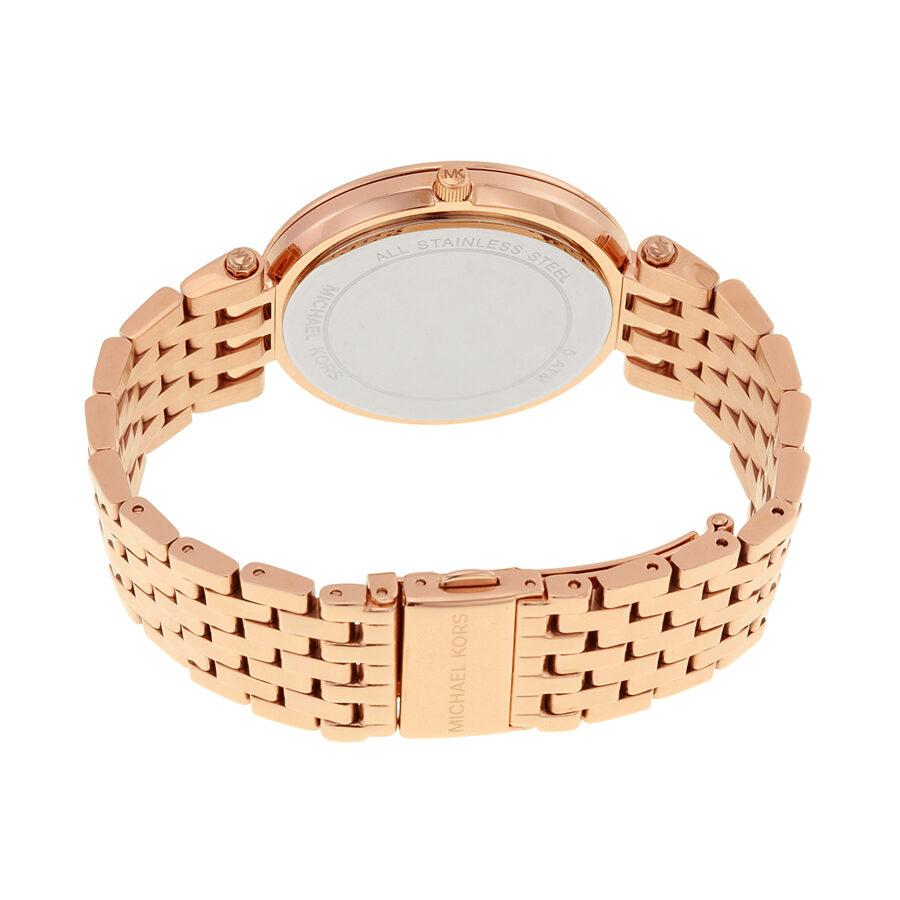 Back view of Michael Kors Darci watch showing rose-gold stainless steel case back and bracelet
