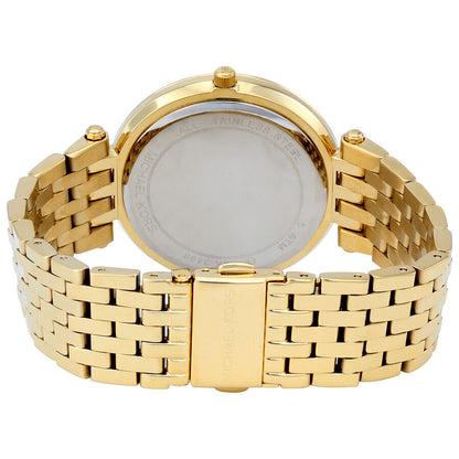 Michael Kors Darci watch caseback showing gold-tone stainless steel and engraved details