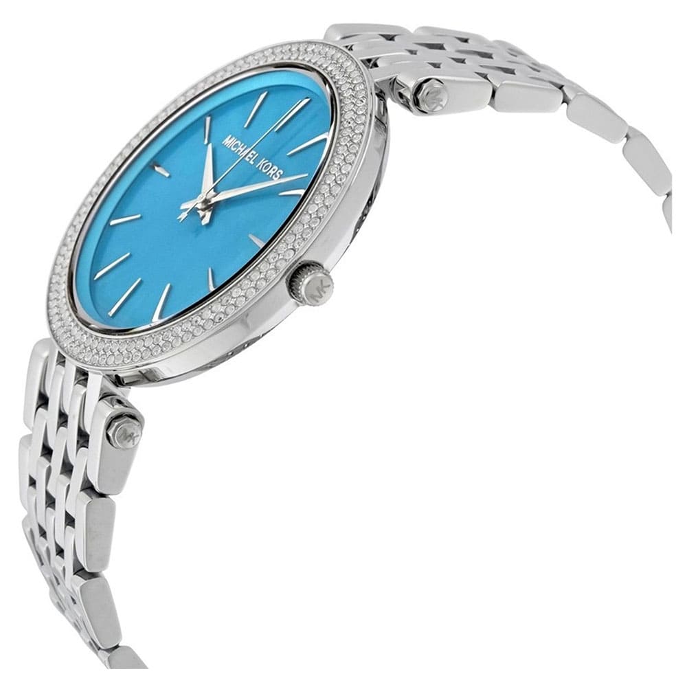 Michael Kors Darci watch side view showing turquoise dial and silver bracelet