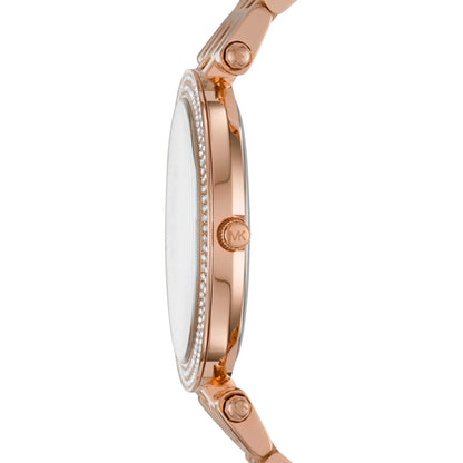 Side view of Michael Kors Darci watch showing rose gold-tone case and crystal bezel