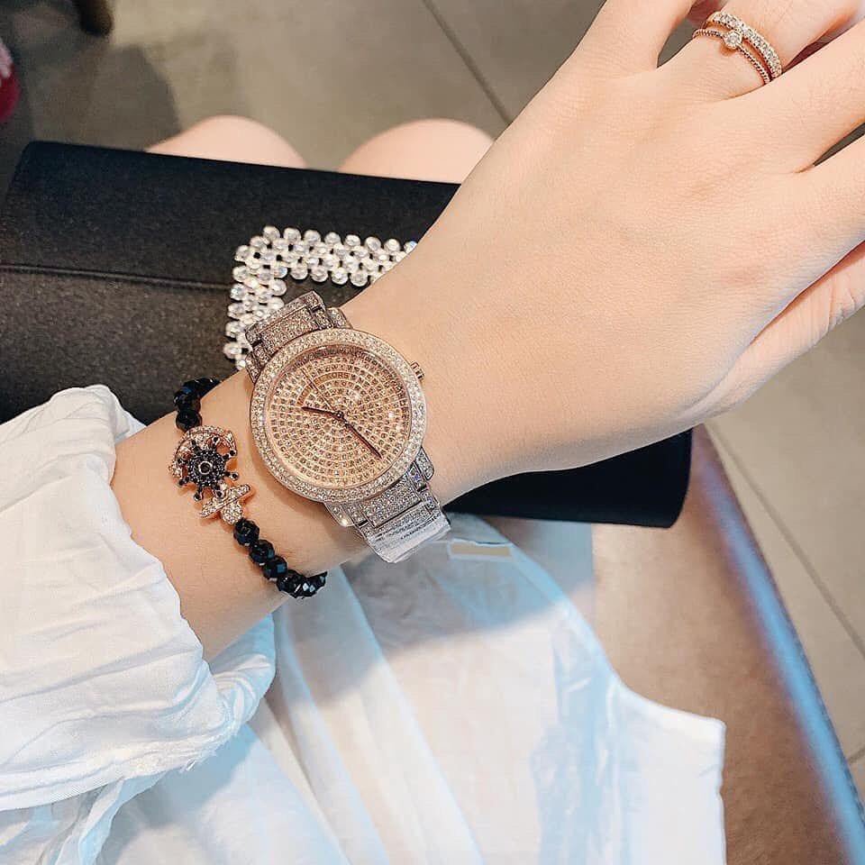 Michael Kors Darci Pave rose gold watch worn on wrist with crystal pave dial