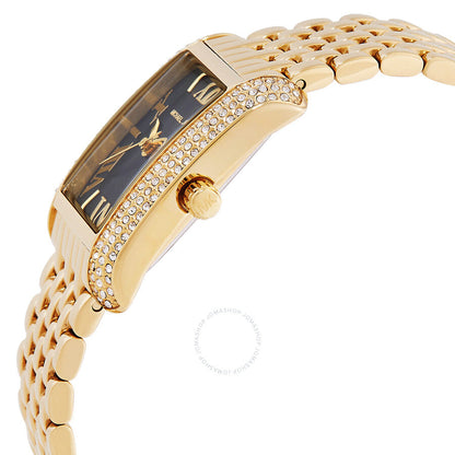 Michael Kors Emery watch side profile showing black dial, crystal bezel, and gold link bracelet