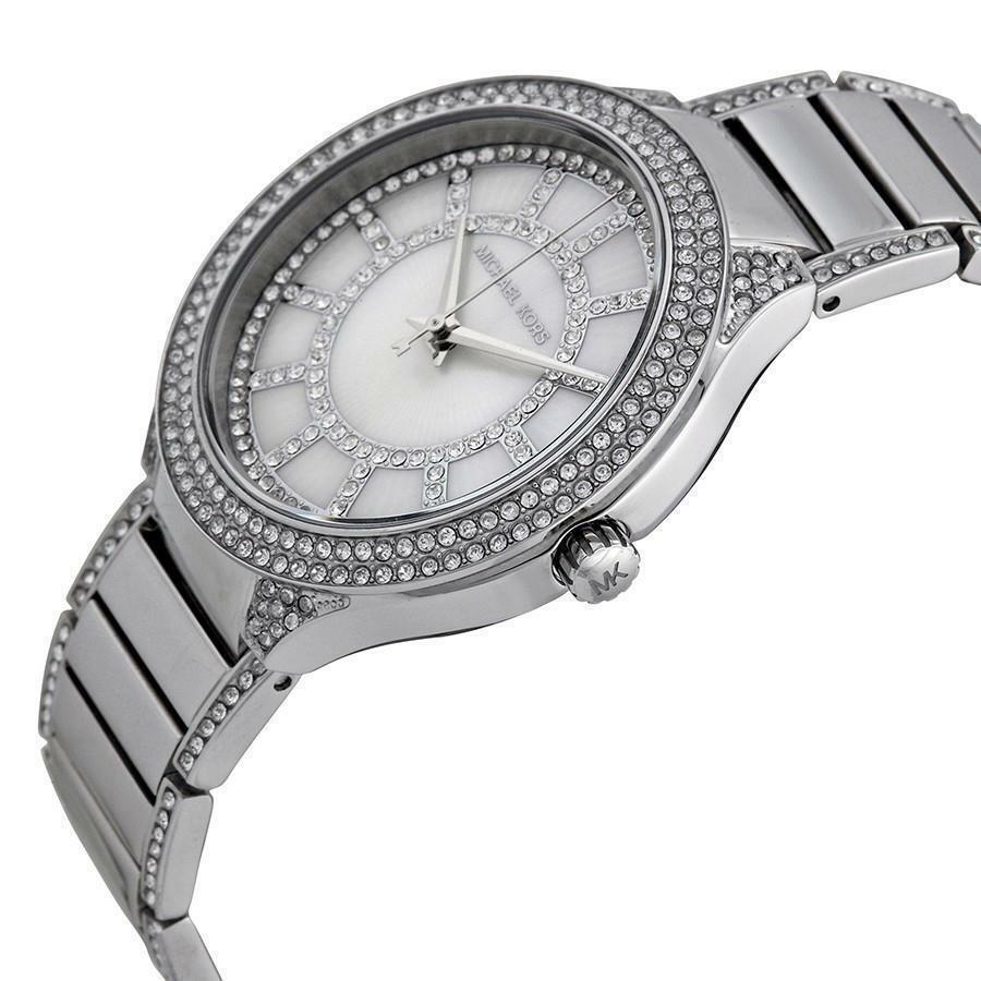 Michael Kors Kerry MK3311 angled view showing mother-of-pearl dial and crystal bezel detail